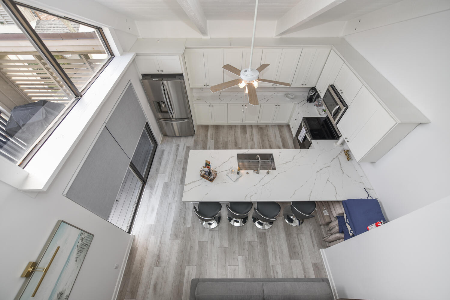 1605 Highway 1, Unit SL3G Jupiter, FL 33477 - Photo 24 of 54 a view of kitchen and dining room with wooden floor