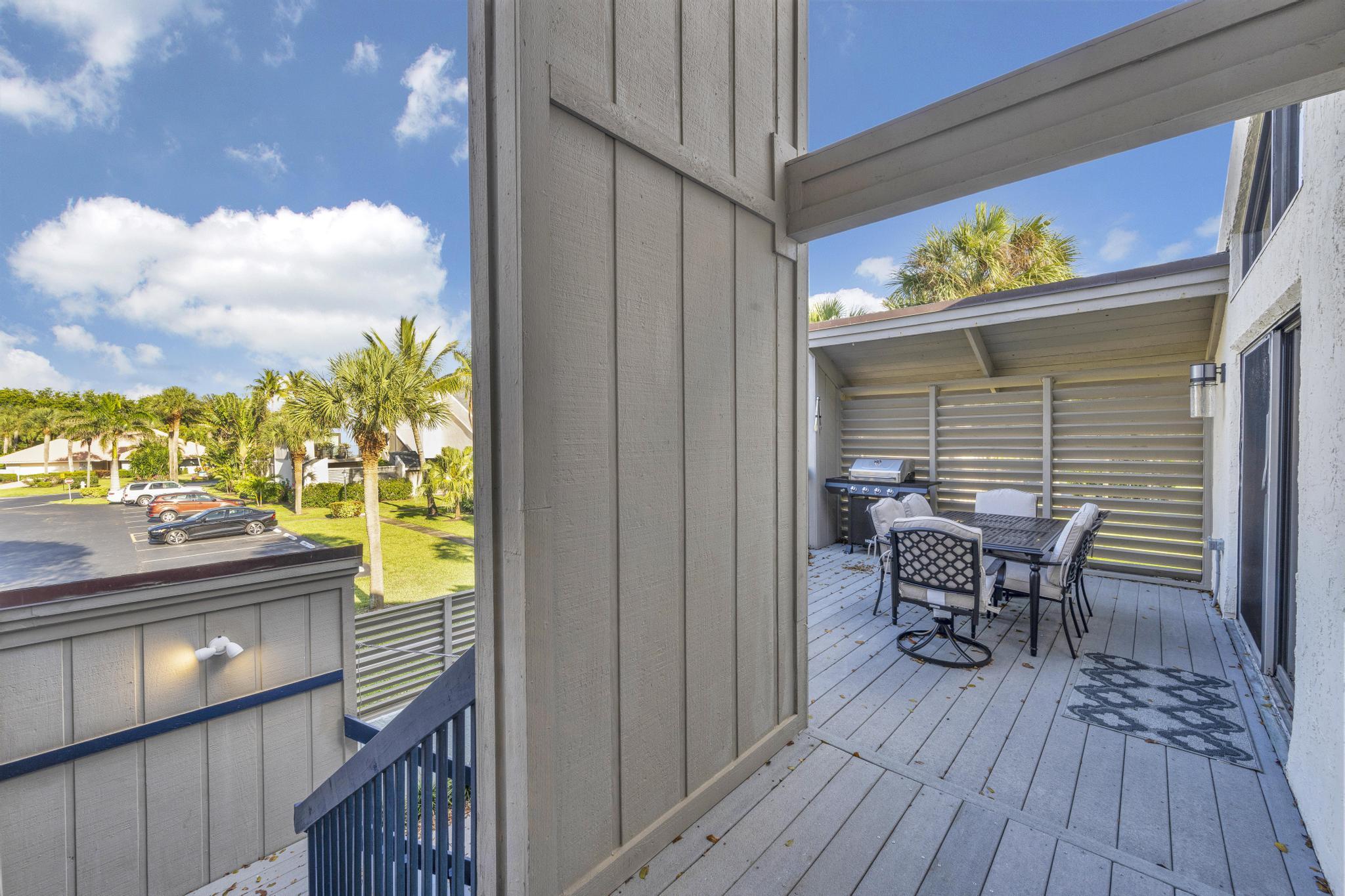 1605 Highway 1, Unit SL3G Jupiter, FL 33477 - Photo 35 of 54 a view of a balcony with furniture