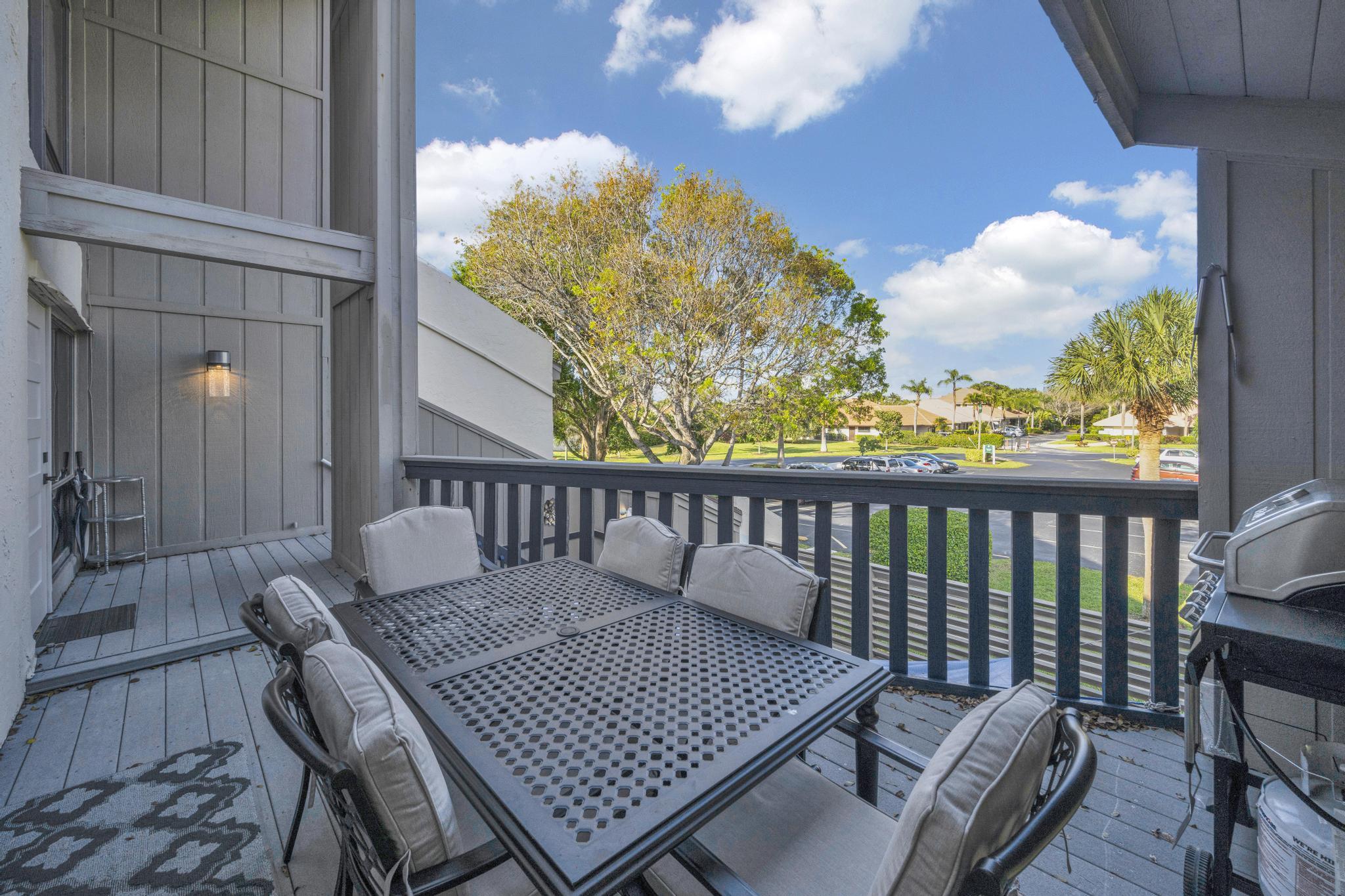 1605 Highway 1, Unit SL3G Jupiter, FL 33477 - Photo 36 of 54 a view of a balcony with wooden floor