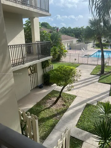 a view of a porch with a bench