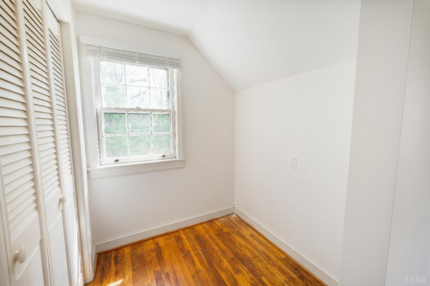 733 Oakville Road Appomattox, VA 24522 - Photo 17 of 52 a view of a room with wooden floor and a window