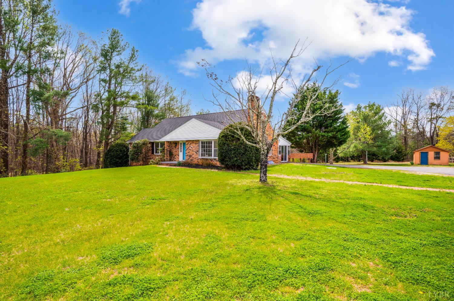 733 Oakville Road Appomattox, VA 24522 - Photo 33 of 52 a front view of house with swimming pool and green space