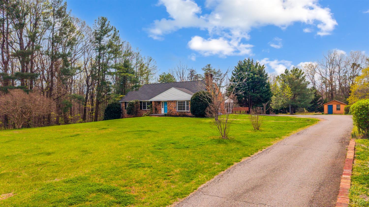 733 Oakville Road Appomattox, VA 24522 - Photo 34 of 52 a view of a swimming pool with a yard