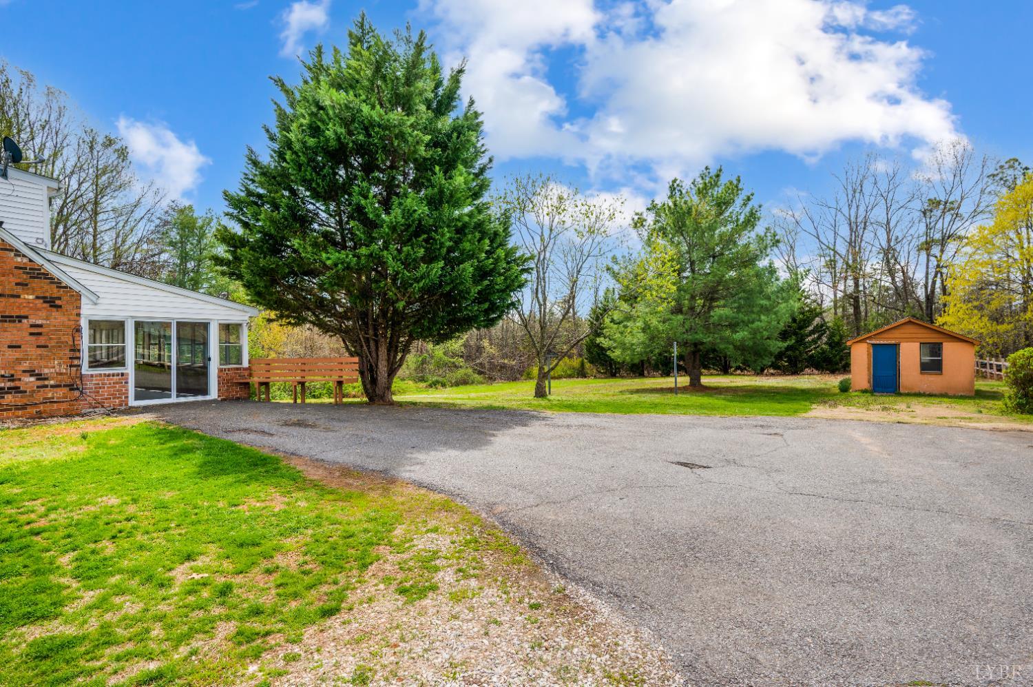 733 Oakville Road Appomattox, VA 24522 - Photo 35 of 52 a view of a house with swimming pool and yard