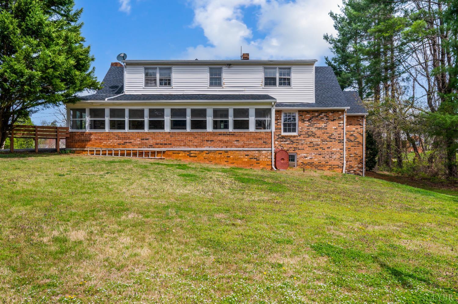 733 Oakville Road Appomattox, VA 24522 - Photo 37 of 52 a front view of a house with a yard