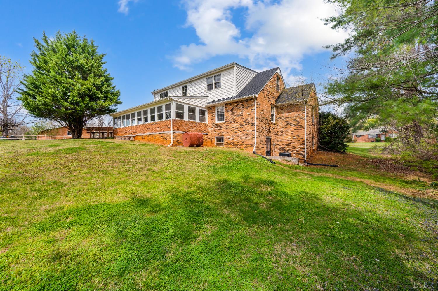 733 Oakville Road Appomattox, VA 24522 - Photo 38 of 52 a front view of a house with garden