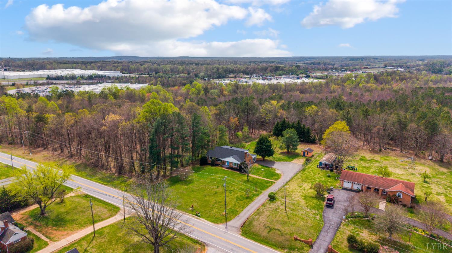 733 Oakville Road Appomattox, VA 24522 - Photo 42 of 52 a view of a lake with a yard