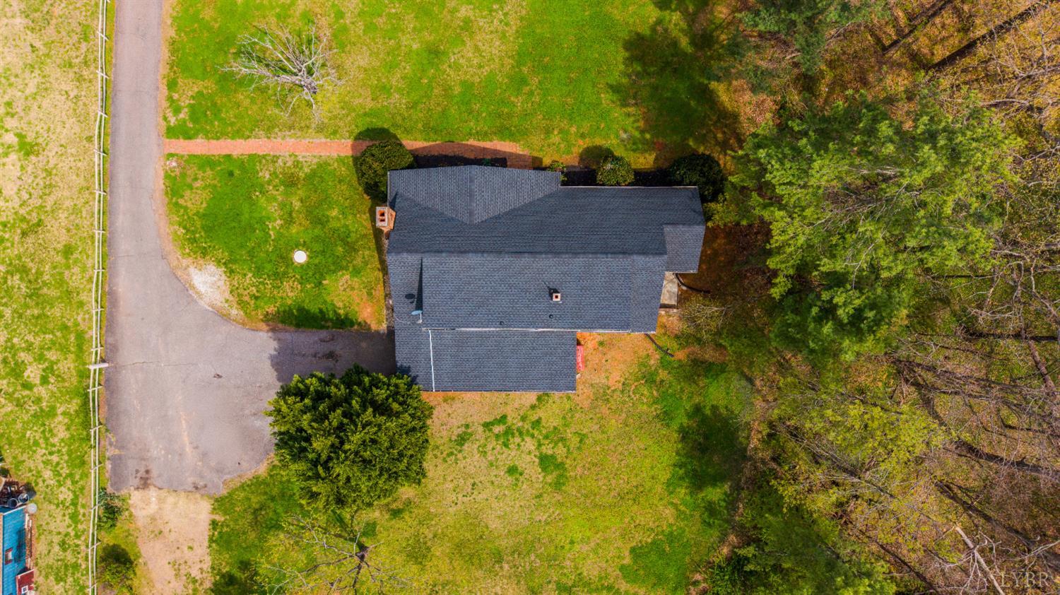 733 Oakville Road Appomattox, VA 24522 - Photo 45 of 52 an aerial view of a house with a yard