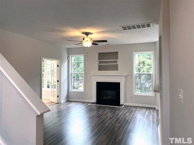1928 Cartier Ruby Lane Raleigh, NC 27610 - Photo 5 of 17 Family room with fireplace