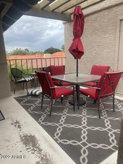 10017 East Mountain View Road, Unit 2058 Scottsdale, AZ 85258 - Photo 20 of 37 a view of a two chairs in the patio