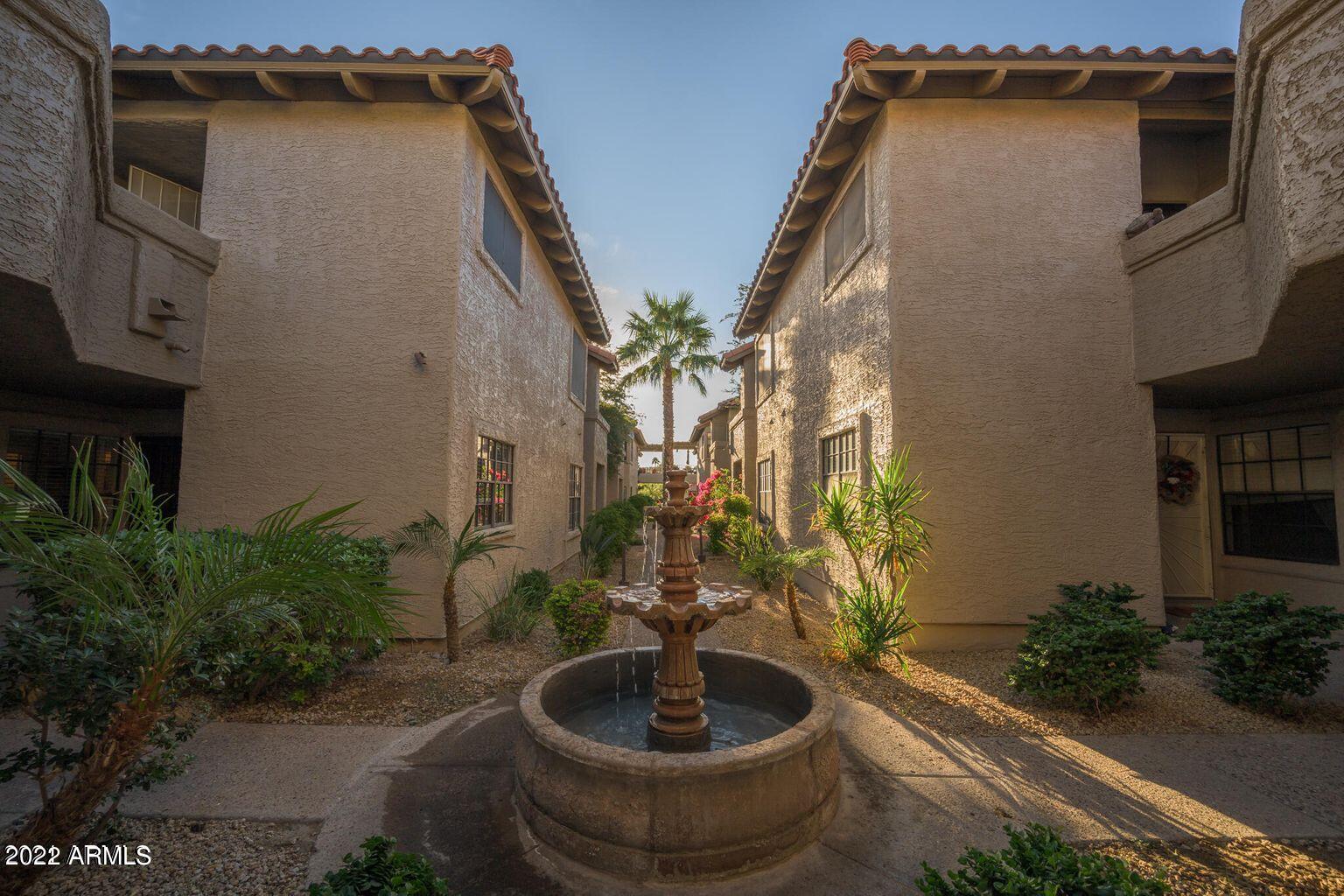 10017 East Mountain View Road, Unit 2058 Scottsdale, AZ 85258 - Photo 2 of 37 a view of a house with a potted plant