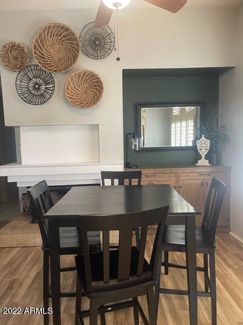 10017 East Mountain View Road, Unit 2058 Scottsdale, AZ 85258 - Photo 23 of 37 a view of a dining room with furniture