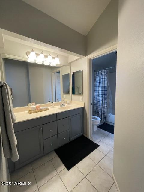10017 East Mountain View Road, Unit 2058 Scottsdale, AZ 85258 - Photo 29 of 37 a large bathroom with a double vanity sink and a mirror