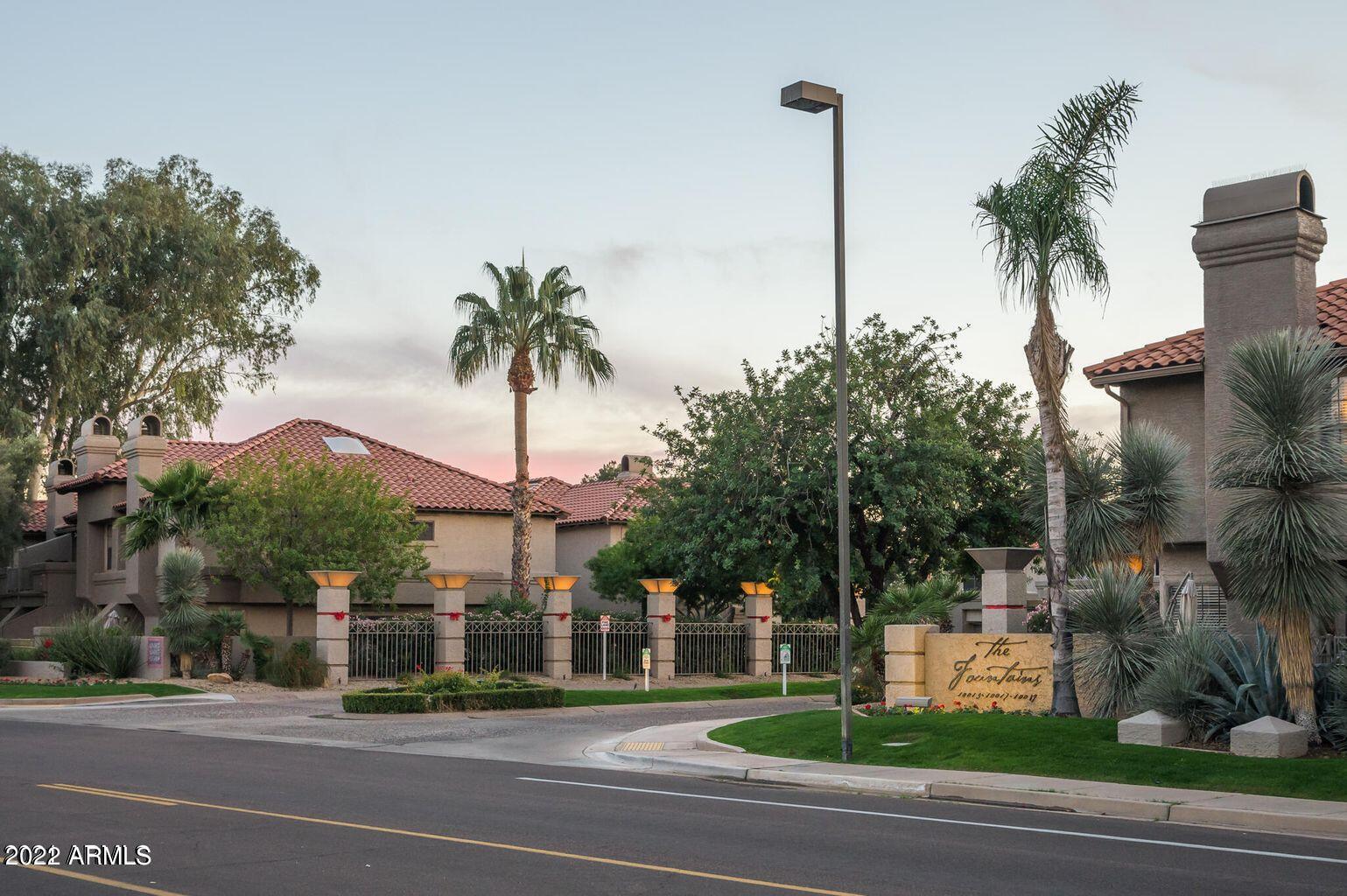 10017 East Mountain View Road, Unit 2058 Scottsdale, AZ 85258 - Photo 3 of 37 a palm tree sitting in front of a building