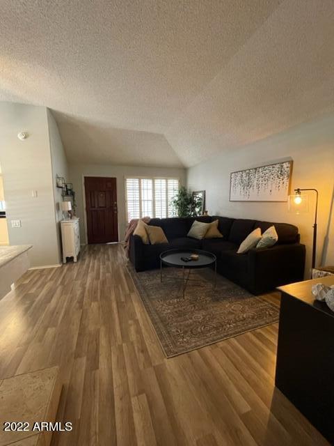 10017 East Mountain View Road, Unit 2058 Scottsdale, AZ 85258 - Photo 33 of 37 a living room with furniture