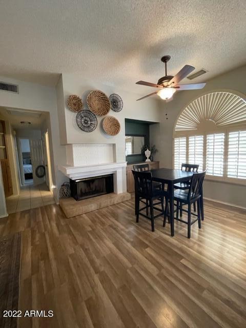 10017 East Mountain View Road, Unit 2058 Scottsdale, AZ 85258 - Photo 35 of 37 a view of a dining room with furniture and chandelier