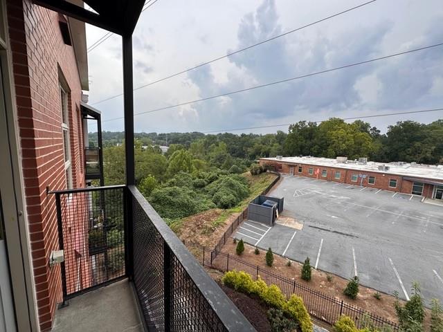 560 Dutch Valley Road Northeast, Unit 2413 Atlanta, GA 30324 - Photo 2 of 11 a view of balcony with furniture