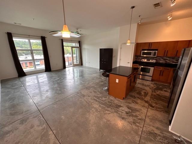 560 Dutch Valley Road Northeast, Unit 2413 Atlanta, GA 30324 - Photo 8 of 11 a view of a room with window and wooden floor