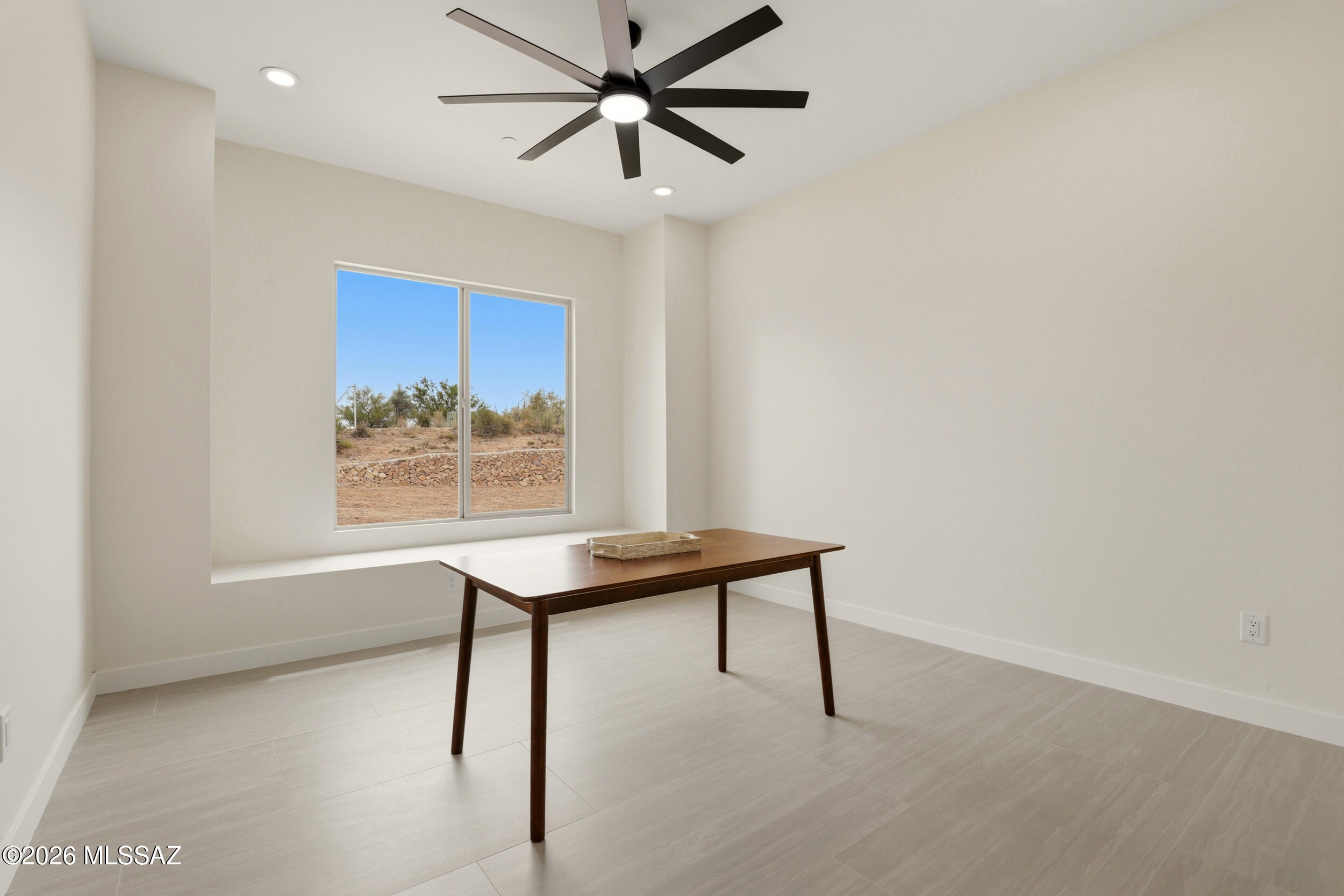 14527 East Sands Ranch Road Vail, AZ 85641 - Photo 31 of 48 a view of a workspace with furniture and a window