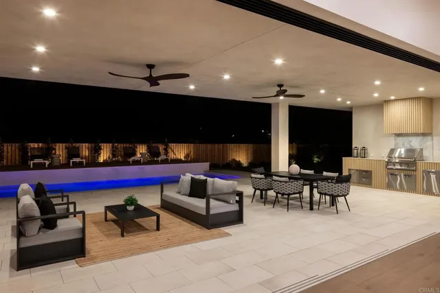 view of living room with furniture and mirror