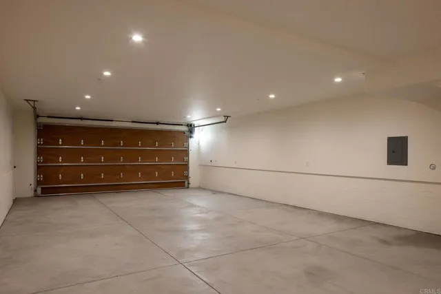 a kitchen with stainless steel appliances granite countertop a stove and a refrigerator