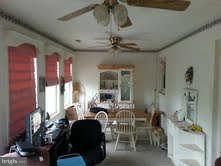 19252 Fort Valley Road Strasburg, VA 22657 - Photo 2 of 11 a living room with furniture and a large window
