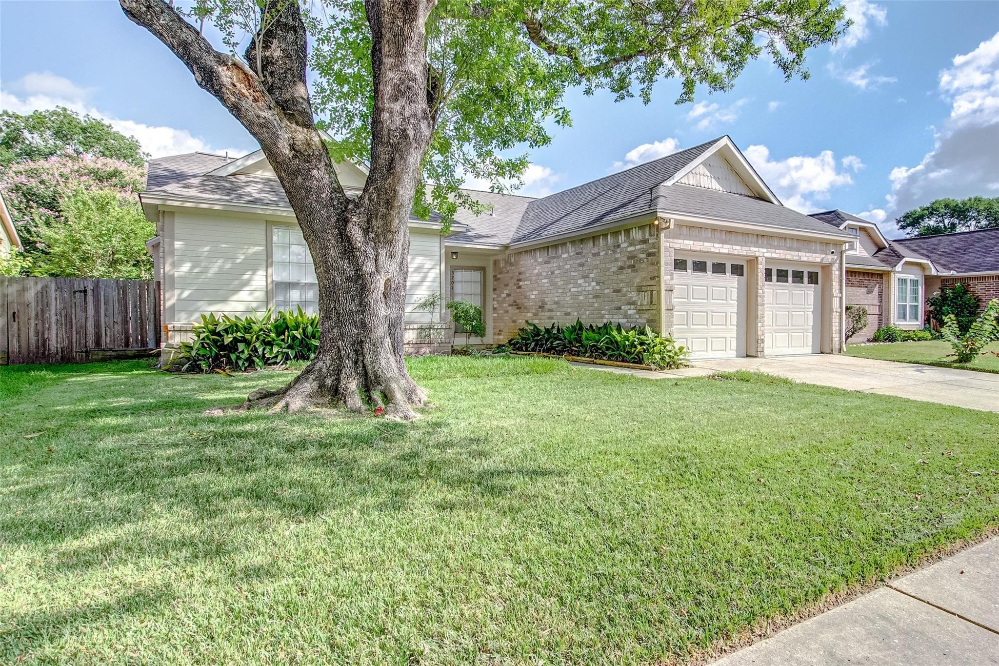 3207 Georgia Pine Drive Spring, TX 77373 - Photo 18 of 29 a front view of a house with garden