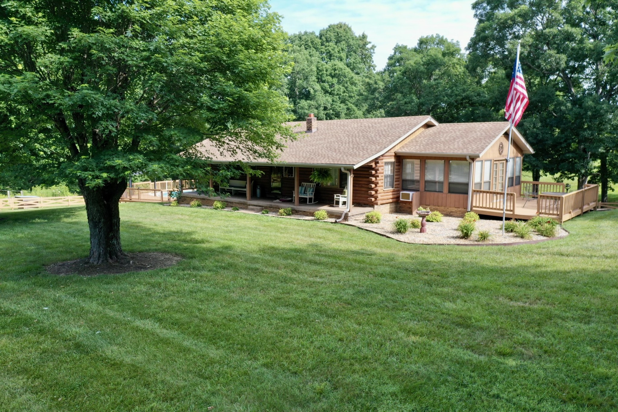 188 Link Road Cottontown, TN 37048 - Photo 1 of 45 a view of a house with a yard patio and sitting area