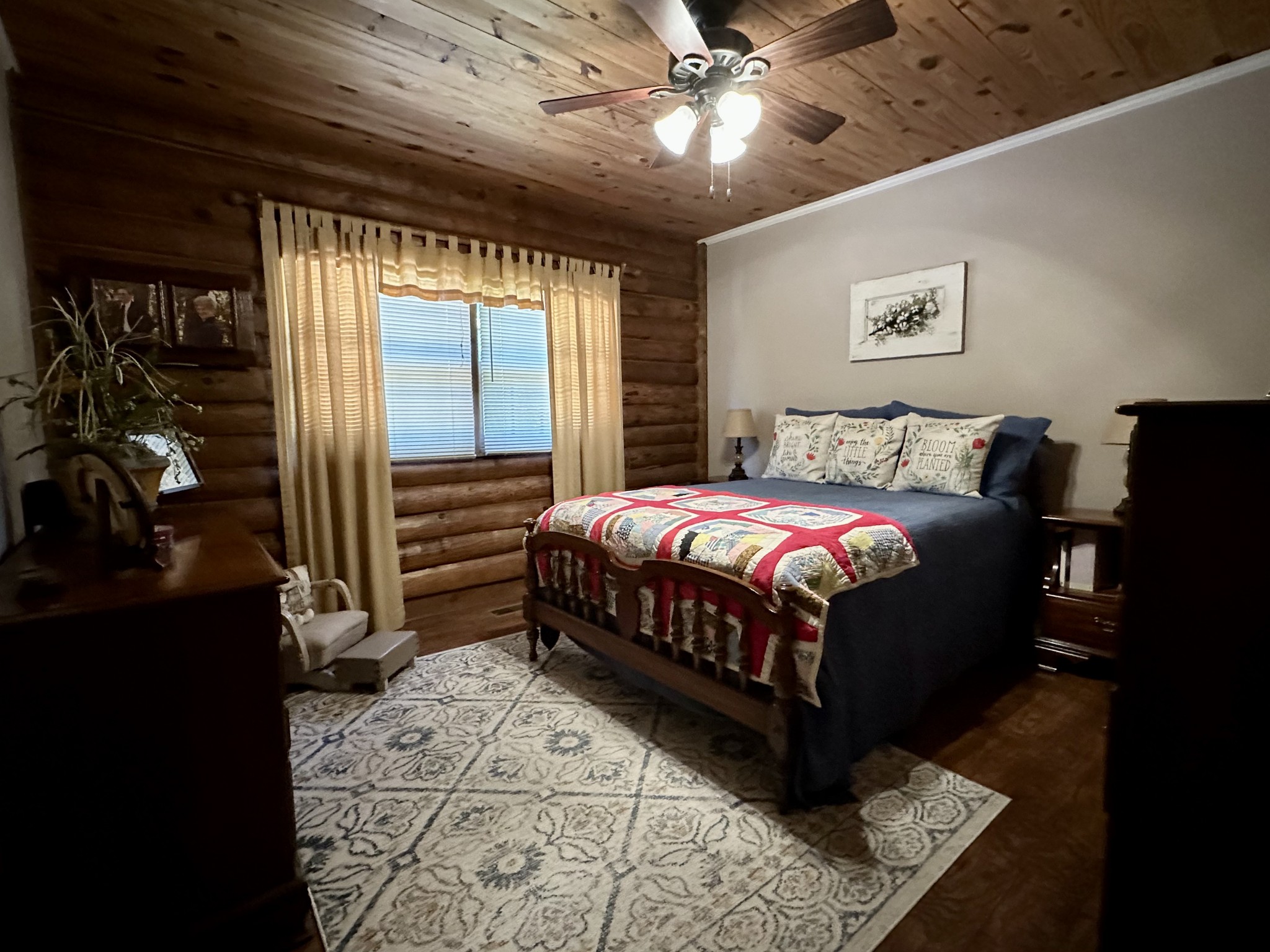 188 Link Road Cottontown, TN 37048 - Photo 12 of 45 a bedroom with a bed painting on wall and a large window
