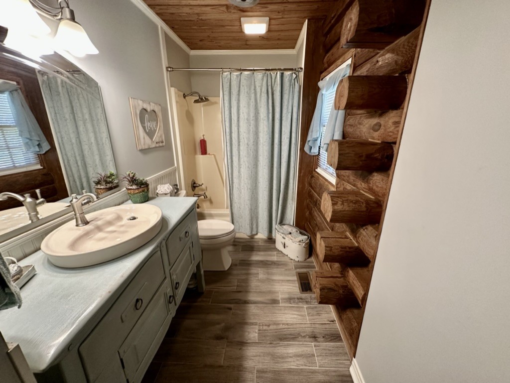 188 Link Road Cottontown, TN 37048 - Photo 13 of 45 a bathroom with a sink a toilet and shower