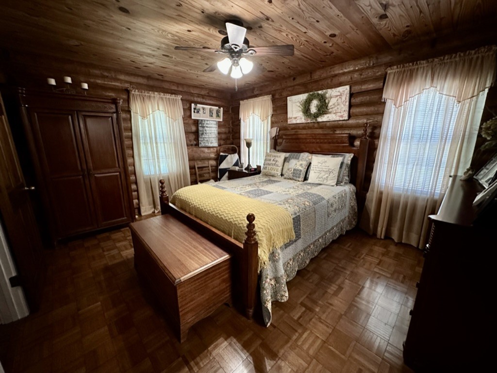 188 Link Road Cottontown, TN 37048 - Photo 15 of 45 a bed sitting in a spacious bedroom next to a window