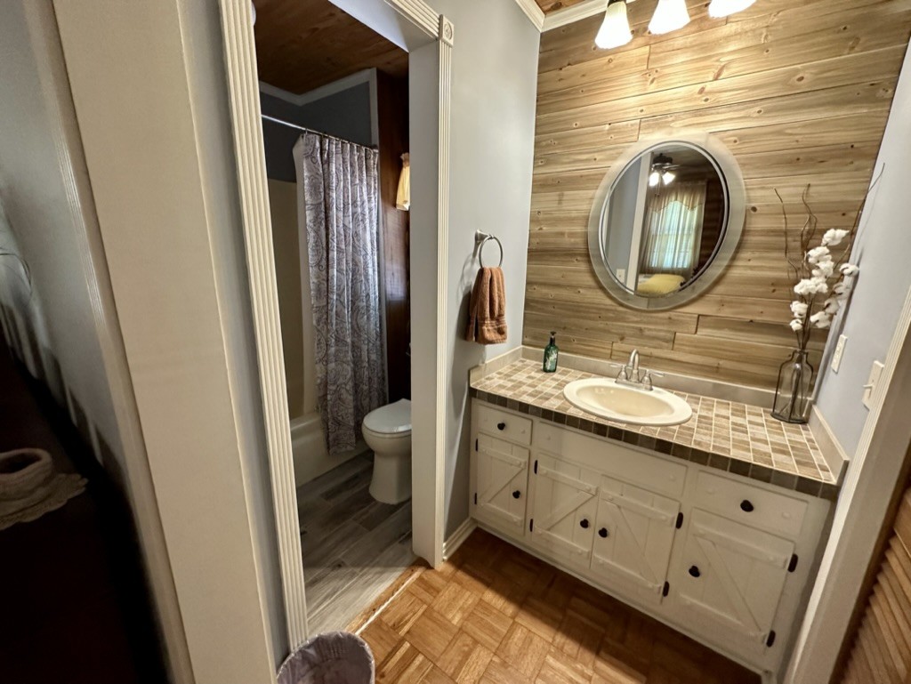 188 Link Road Cottontown, TN 37048 - Photo 16 of 45 a bathroom with a granite countertop sink toilet and shower
