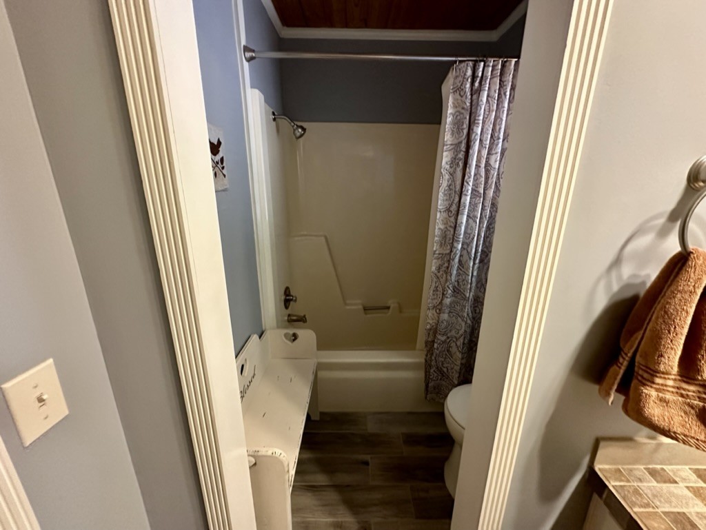 188 Link Road Cottontown, TN 37048 - Photo 17 of 45 a bathroom with a tub a sink and a shower