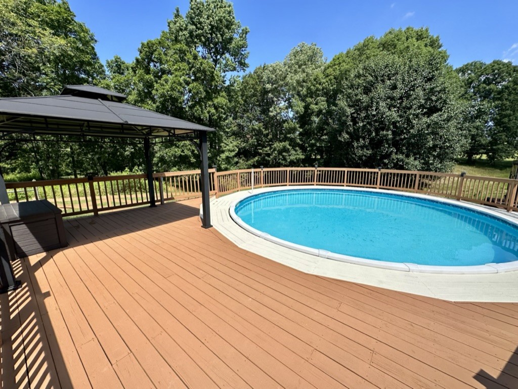 188 Link Road Cottontown, TN 37048 - Photo 23 of 45 a view of outdoor space yard swimming pool and deck