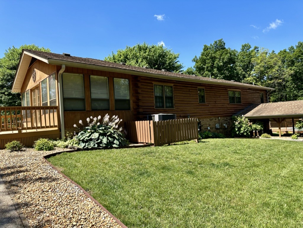 188 Link Road Cottontown, TN 37048 - Photo 25 of 45 a front view of a house with garden
