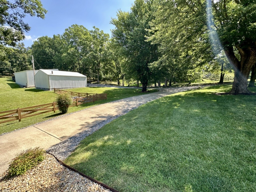 188 Link Road Cottontown, TN 37048 - Photo 28 of 45 a view of a yard with large trees