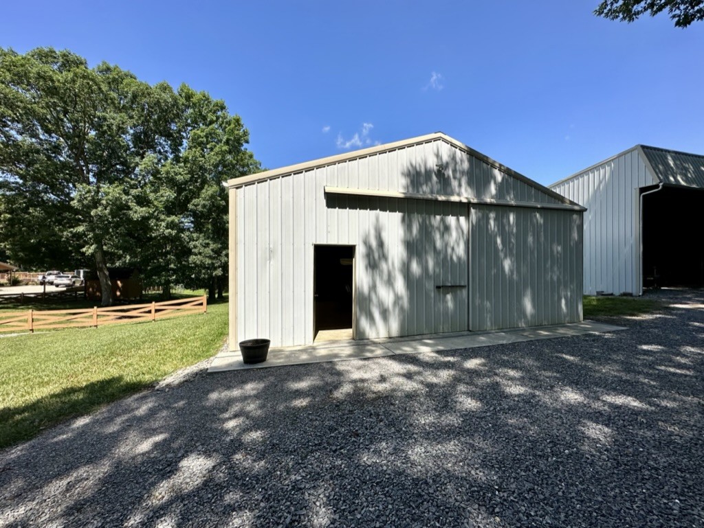 188 Link Road Cottontown, TN 37048 - Photo 30 of 45 a view of a house with backyard and garden
