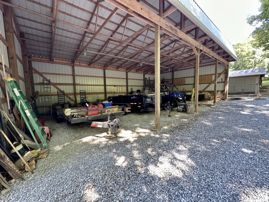 188 Link Road Cottontown, TN 37048 - Photo 34 of 45 a view of a garage with a car parked