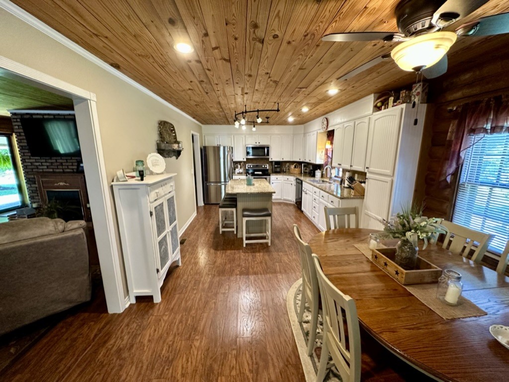 188 Link Road Cottontown, TN 37048 - Photo 7 of 45 a view of a dining room with furniture window and wooden floor