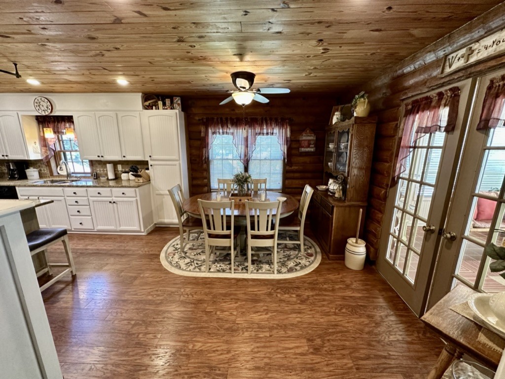 188 Link Road Cottontown, TN 37048 - Photo 8 of 45 a view of a dining room with furniture window and wooden floor