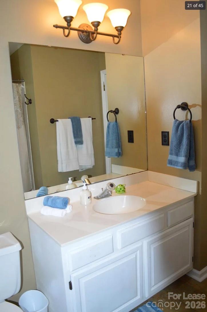 4167 Greenview Court Fort Mill, SC 29708 - Photo 10 of 16 a bathroom with a sink and a mirror