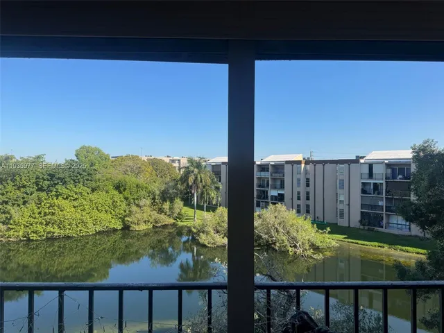 a view of a balcony with lake view