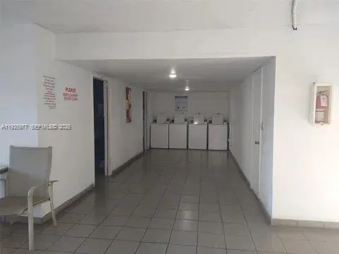 a view of a room with dryer and washer