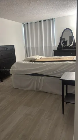 a bathroom with a sink a toilet and a vanity