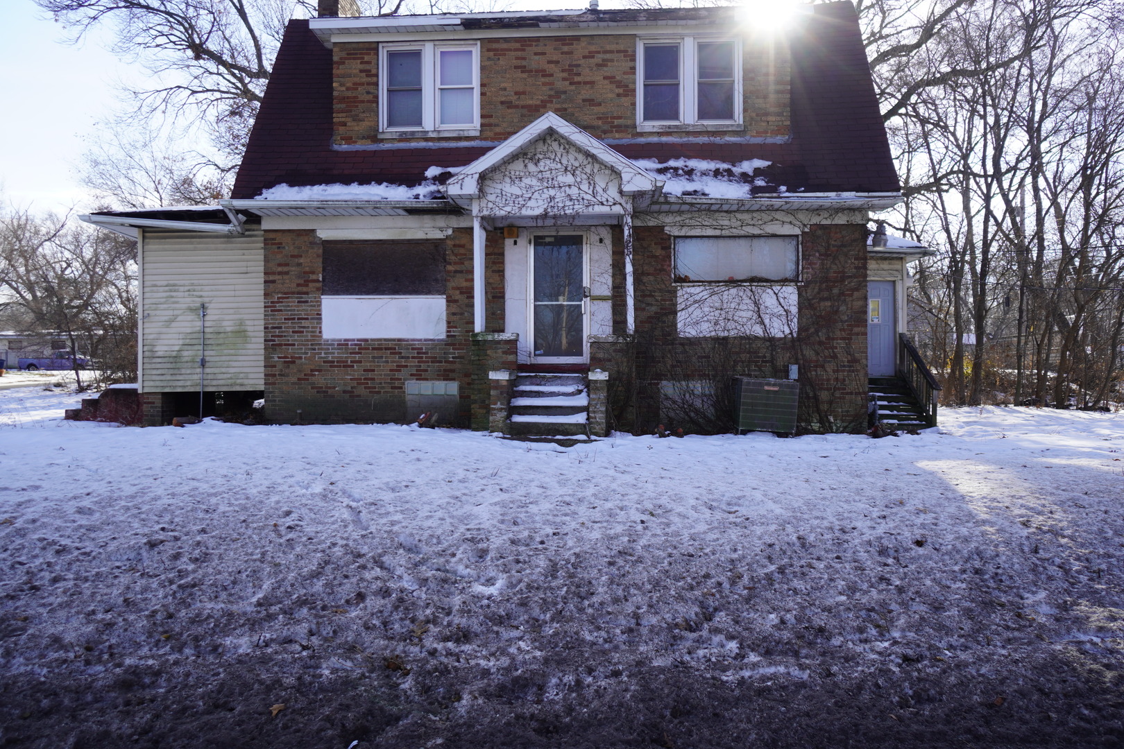 5425 Melton Road Gary, IN 46403 - Photo 1 of 31 a front view of a house with a yard