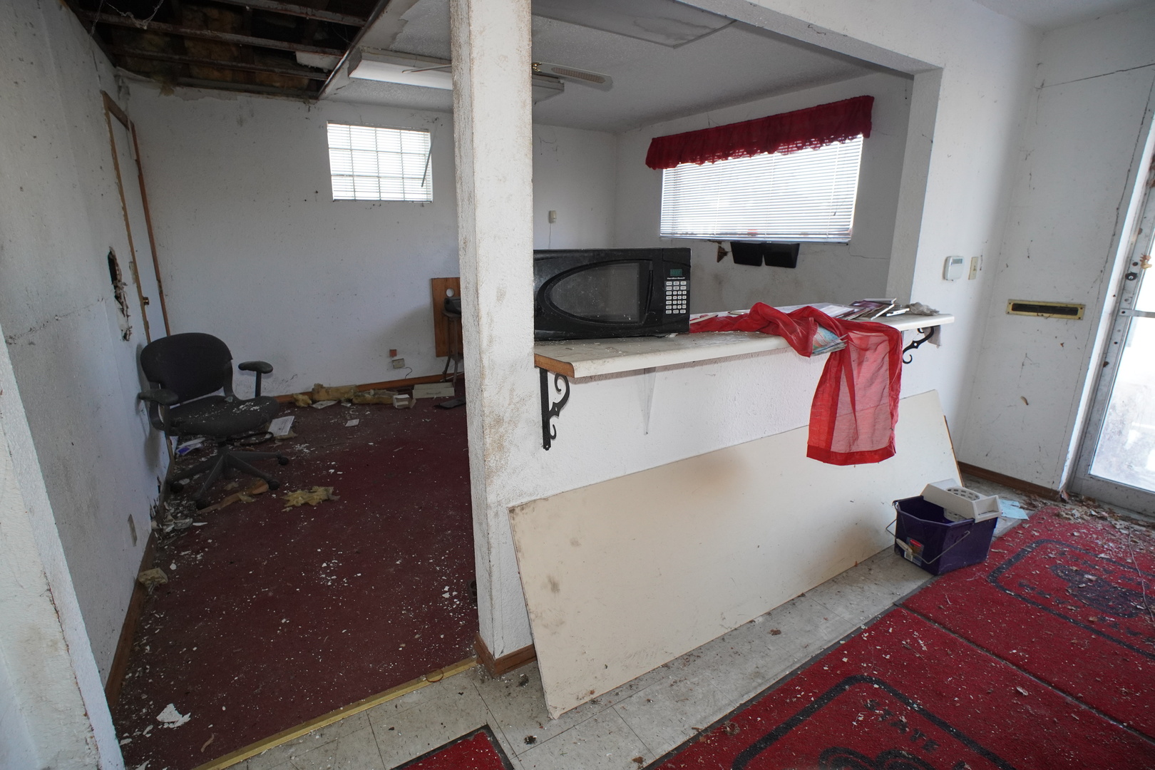 5425 Melton Road Gary, IN 46403 - Photo 17 of 31 a room with gym equipment and a flat screen tv