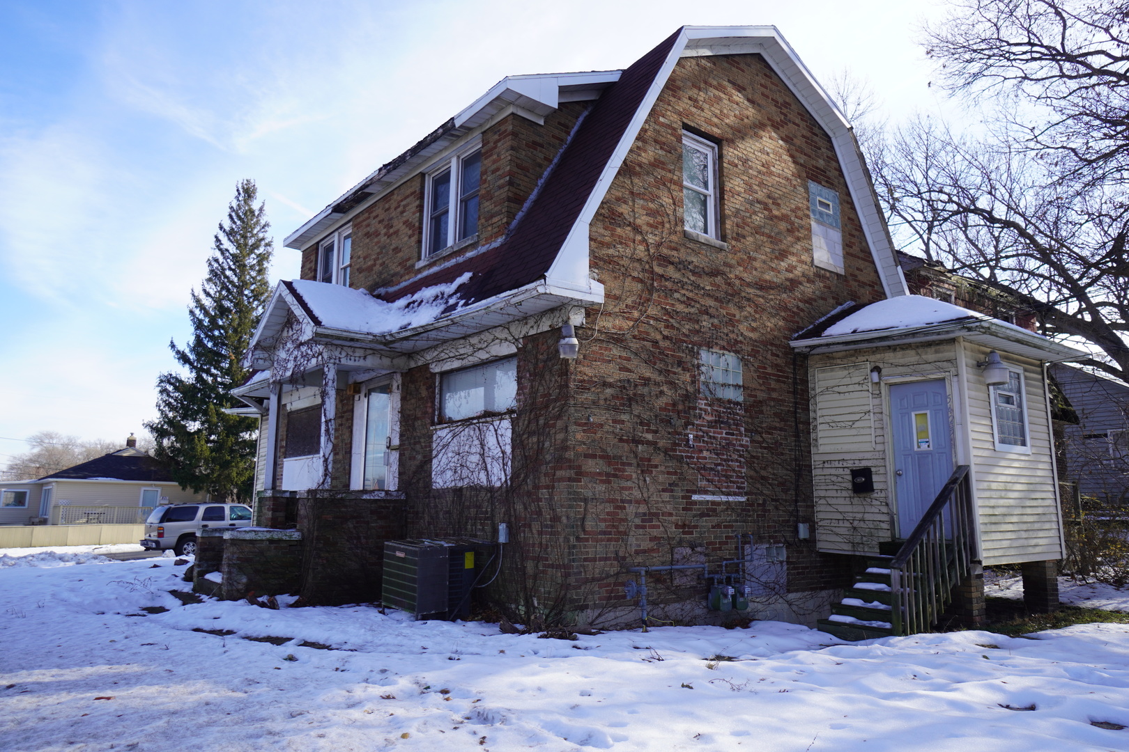 5425 Melton Road Gary, IN 46403 - Photo 2 of 31 a front view of a house with a yard