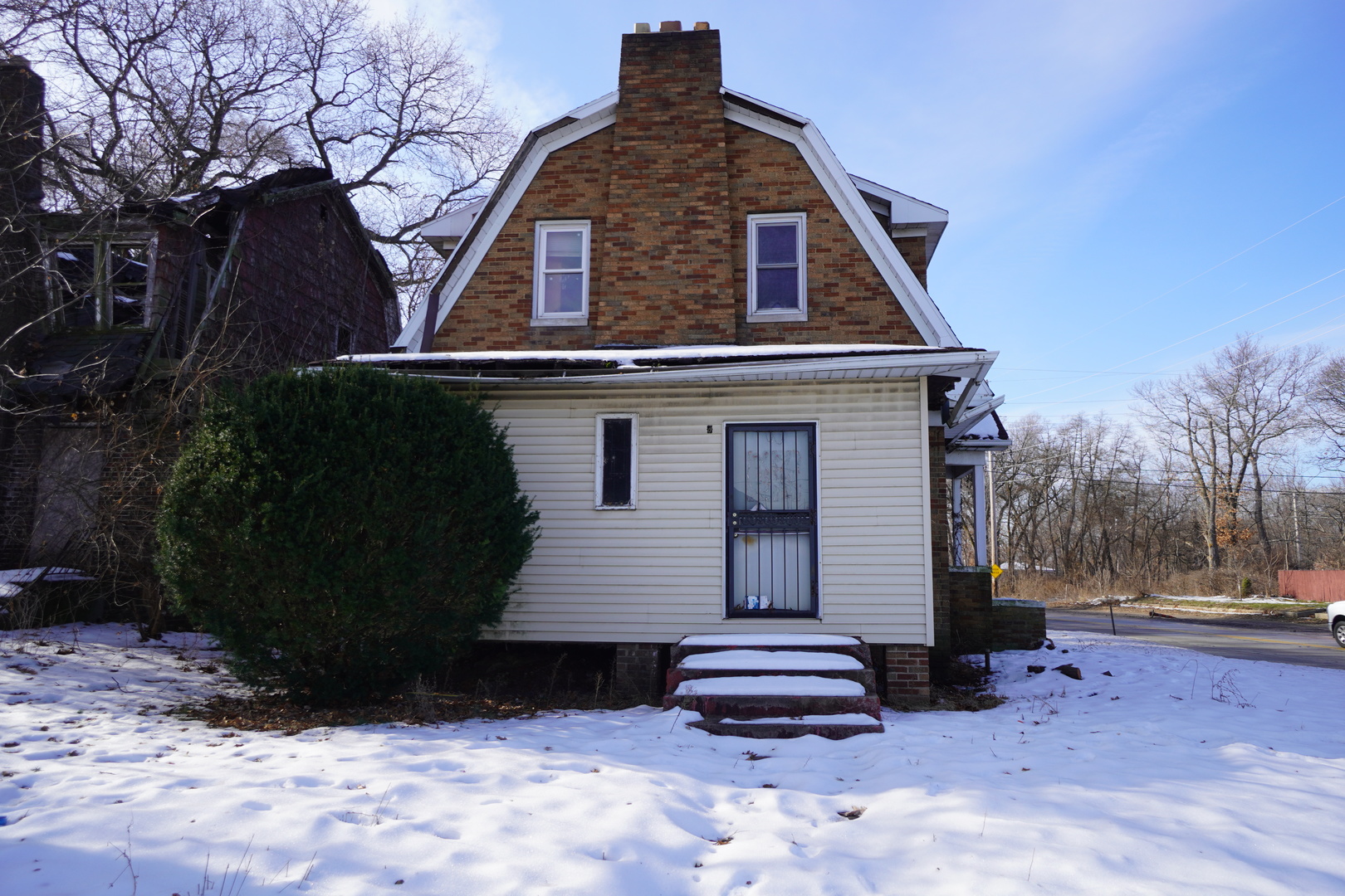 5425 Melton Road Gary, IN 46403 - Photo 4 of 31 a front view of a house with a yard
