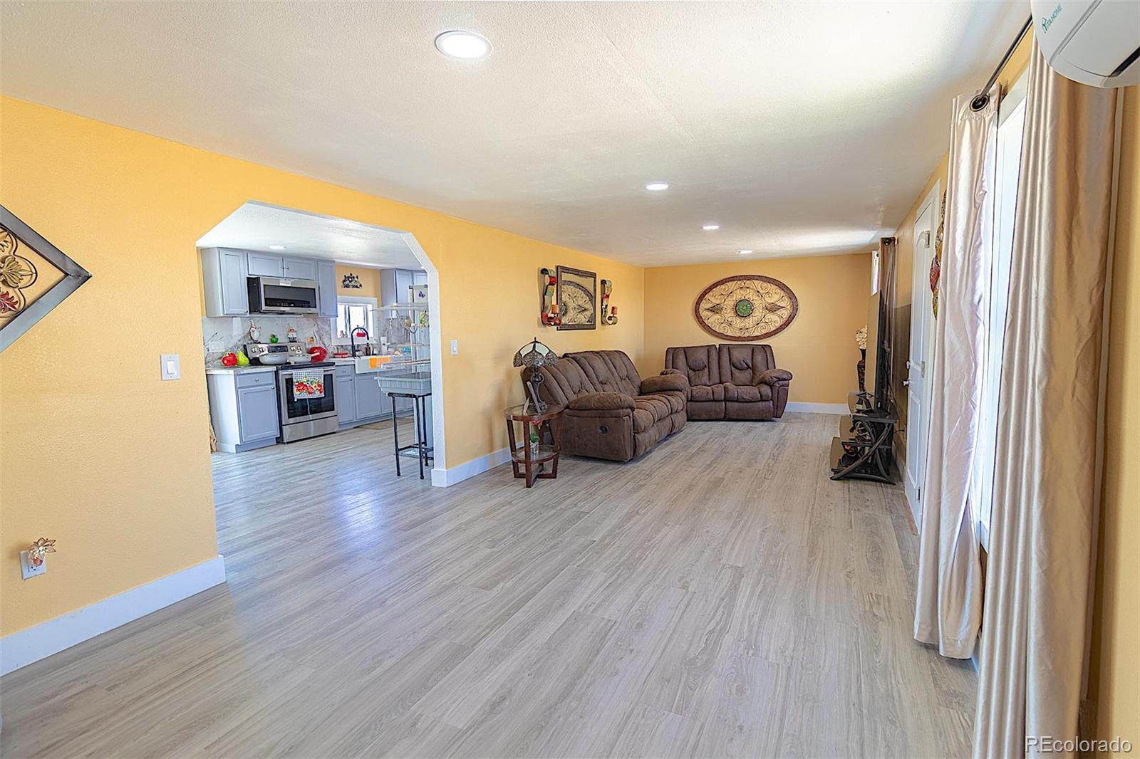 3415 Wiesner Road Calhan, CO 80808 - Photo 26 of 33 a view of a livingroom with furniture and wooden floor