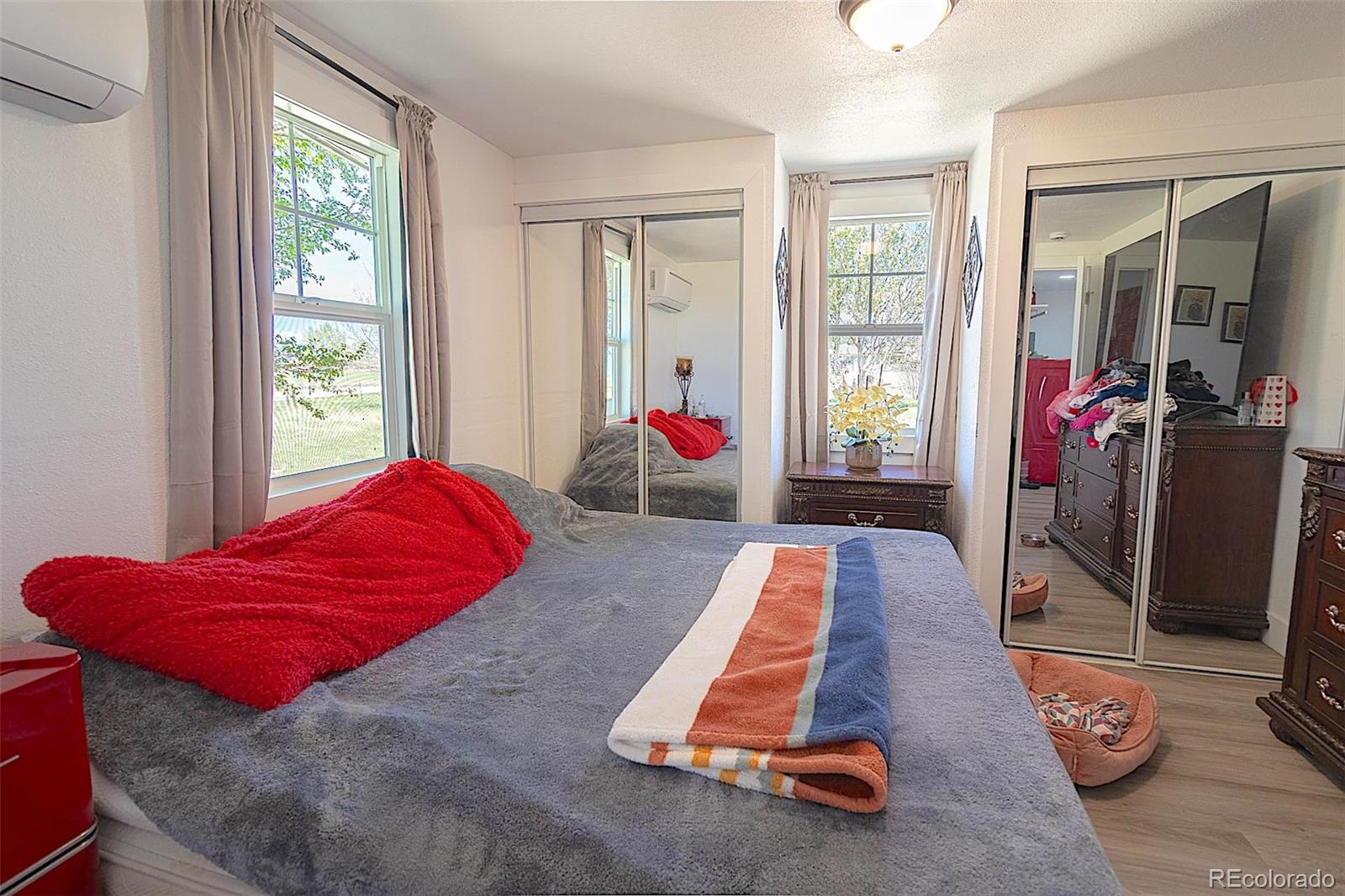 3415 Wiesner Road Calhan, CO 80808 - Photo 32 of 33 a living room with furniture gym equipment and a large window